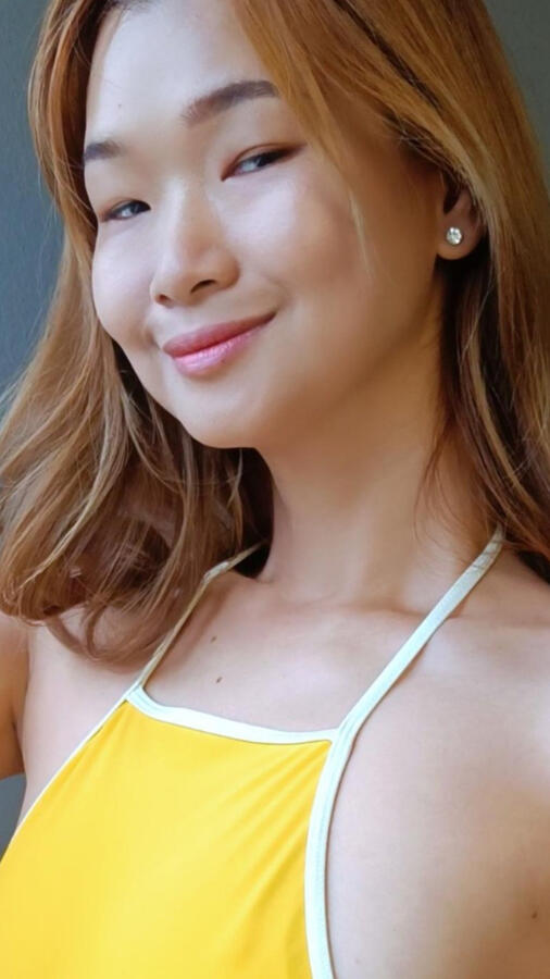 Tickypose in yellow swimsuit, sharing quiet smiles and travel moments.